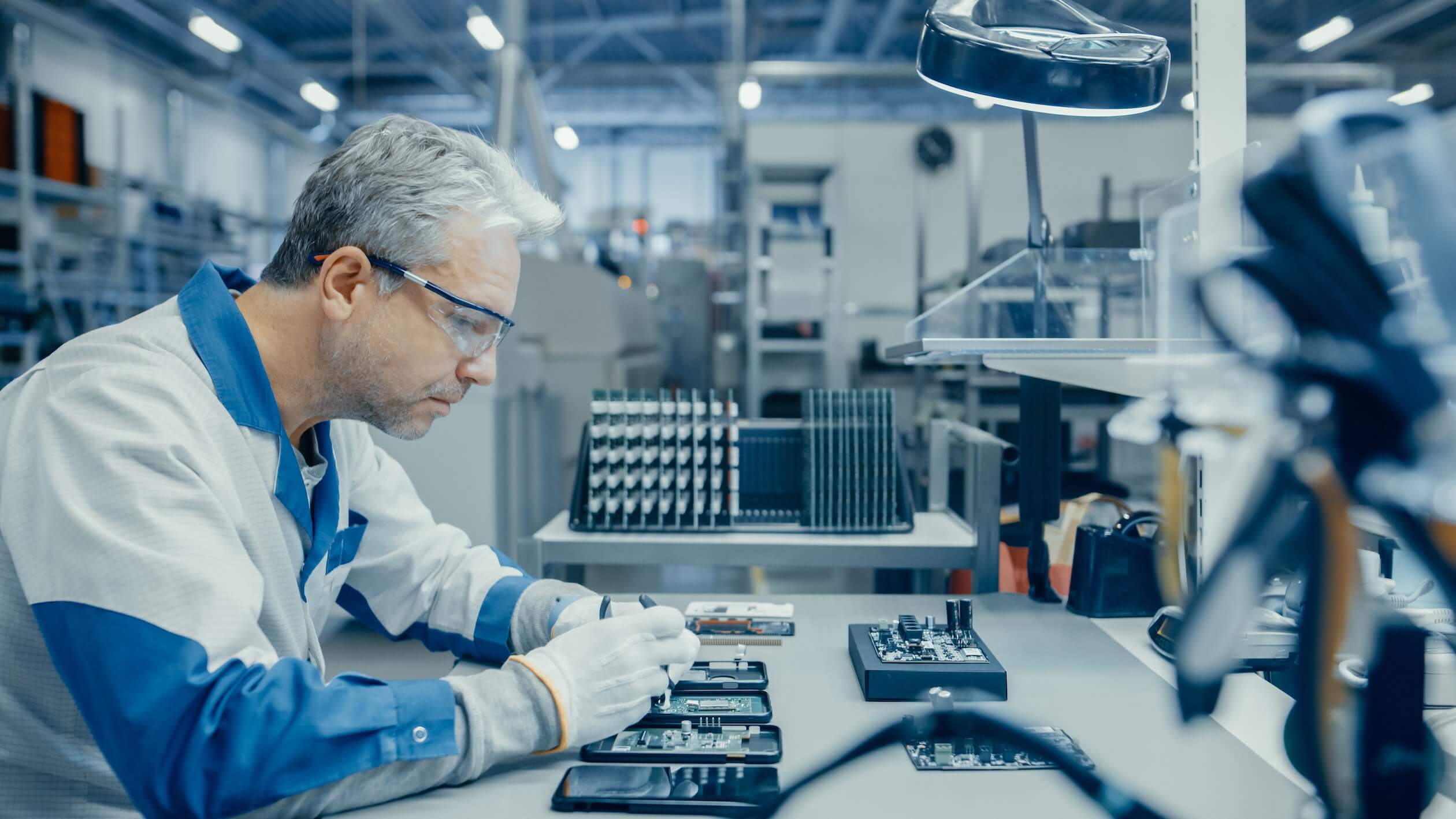 Scientist working in lab using equipment. 